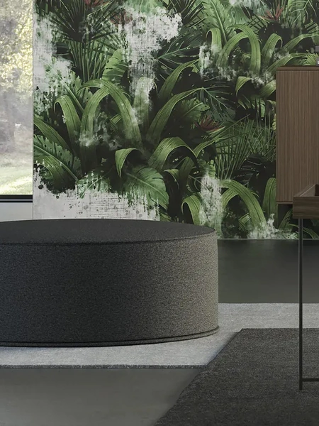 Pouf dalla forma circolare in tessuto Mitos di Doimo Salotti