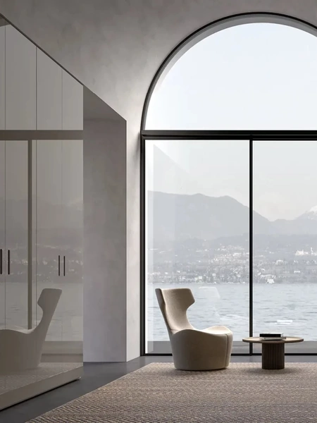 Armadio Atelier bifacciale con anta Fit realizzata in vetro laccato con finitura Fango di Adok