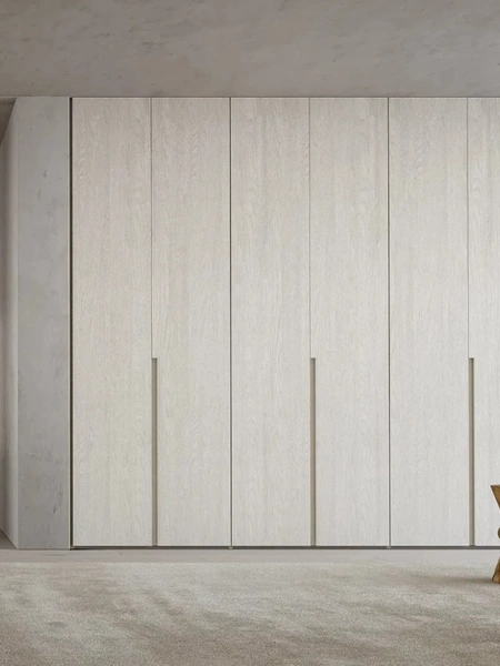 Armadio Atelier in melaminico finitura Alaska ad anta battente Joint con gola di Adok