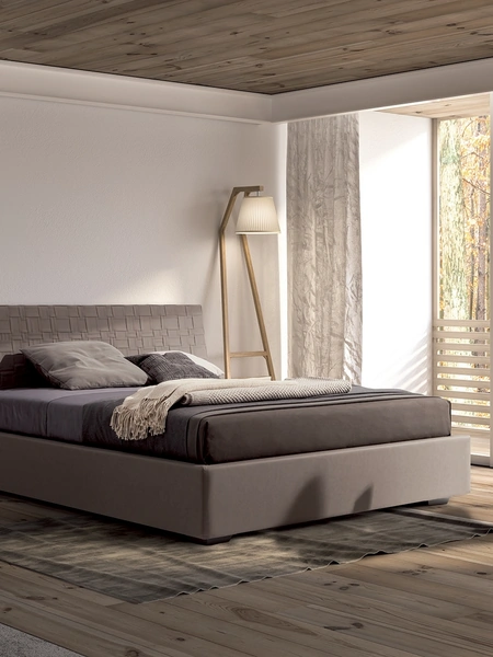 Letto in pelle con testiera intrecciata Compasso di Confort Line