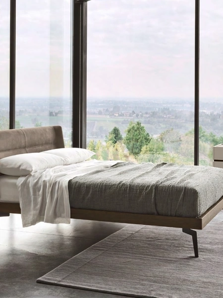 Letto in pelle vintage con testiera Nest di Sangiacomo