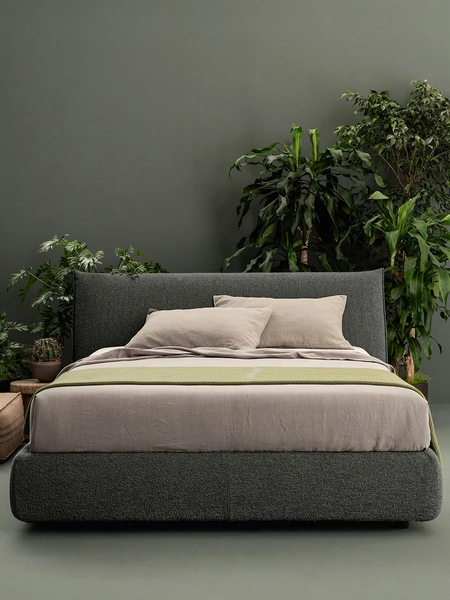 Letto imbottito morbido e avvolgente in tessuto con contenitore Toffee di Caccaro