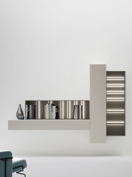 Libreria di design sospesa caratterizzata da moduli orizzontali e verticali aperti e chiusi che si intrecciano di Caccaro