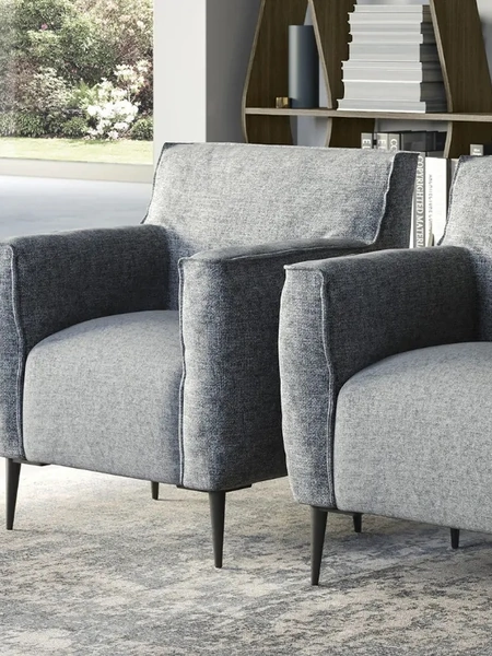 Poltroncina morbida in tessuto Luna di Doimo Salotti