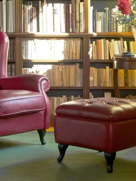 Poltrona classica in pelle imbottita con schienale alto trapuntato Bergere di Doimo Salotti