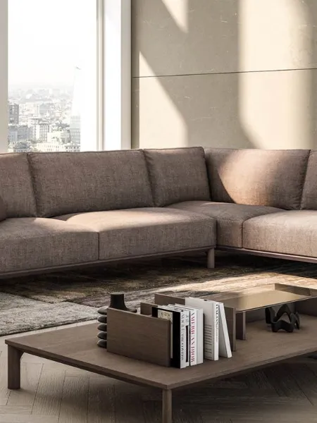 Divano ad angolo in tessuto con libreria Leonard di Doimo Salotti