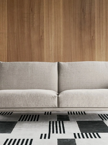 Divano lineare Wing rivestimento tessuto con schienale e braccioli regolabili di Twils Lounge