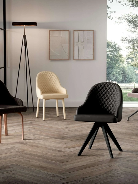 Sedia Demetra in pelle o tessuto di Ozzio