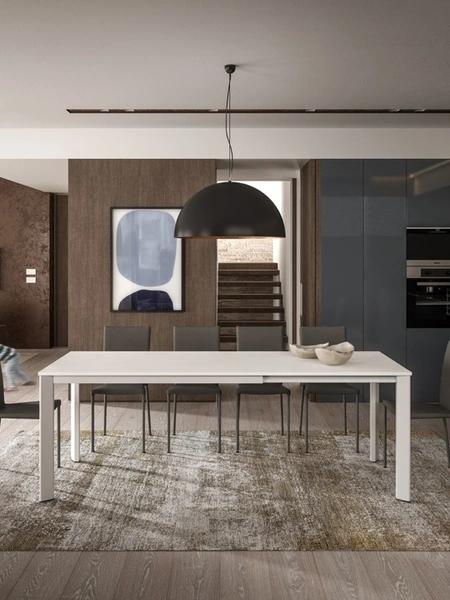 Tavolo allungabile Mix Expo con top finitura Ecolegno Bianco spatolato e base in metallo di Easyline