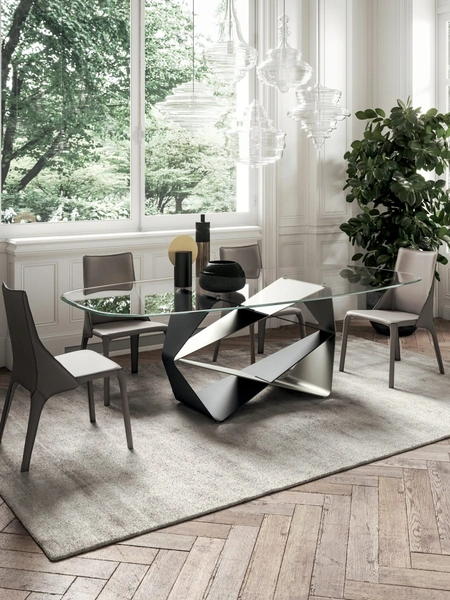 Tavolo scultura con piano in cristallo e base in metallo Gem di Ozzio